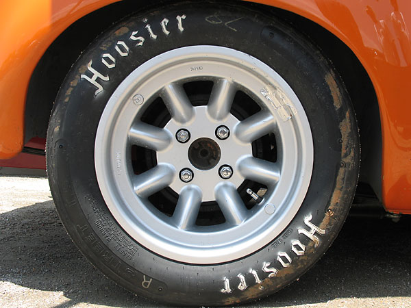 Minilite MagStyle aluminum 8J15 wheels with Hoosier Street T.D. P245/45D15 bias-ply racing tires.