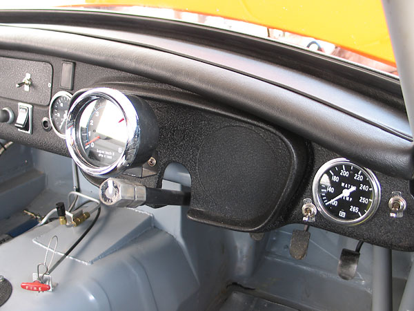 SunPro Super Tach II tachometer (0-8000rpm). Stewart Warner water temperature gauge (100-265F).