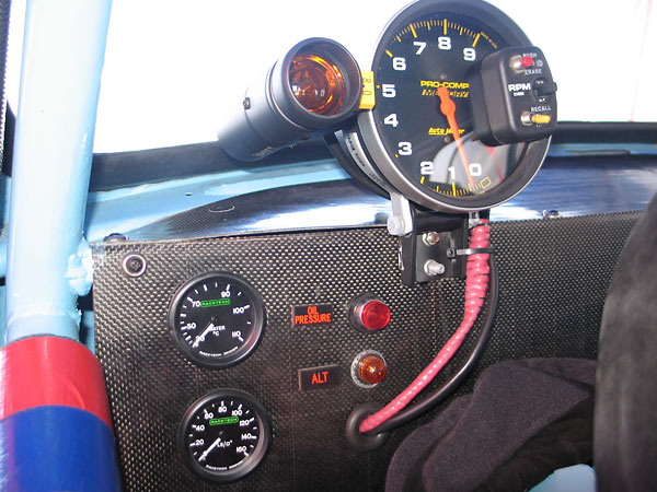 AutoMeter Pro-Comp Memory tachometer (0-9000rpm) with programmable shift light (set at 8000rpm).