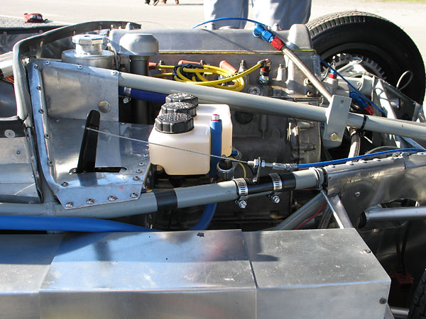 Throttle pedal extends through the top of the footbox. (The original Lola-OSCA wasn't built this way.)
