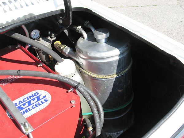 Top left: Filter King fuel filter. Right: oil reservoir for dry sump lubrication system.