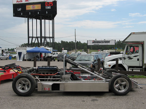 Half tubular steel frame and half aluminum monocoque.