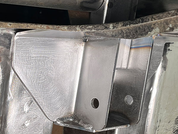 Trial installation of upper-link bracket